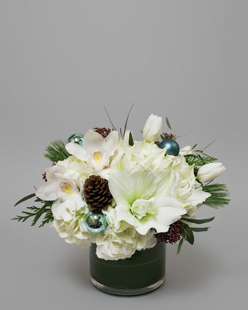 An example of a Winter Surprise bouquet, a unique mix of fresh seasonal  white flowers.
